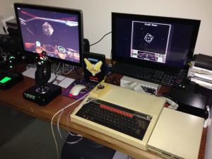 Docking at a Coriolis station in the original Elite on a BBC Micro and in Elite:Dangerous on a PC.